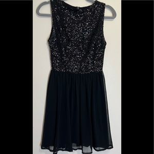 Tobi Fit and Flare Black Sequin Dress. Sheer lined Skirt. Tiny Sequins Stretch S